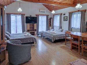 Postel nebo postele na pokoji v ubytování Apartment Feher Lendava + 37 fotografií