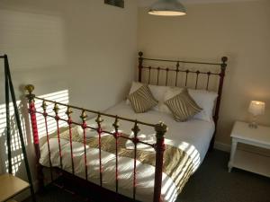 a bedroom with a bed with christmas decorations on it at Victoria Quays Apartments, Fleetwood in Fleetwood