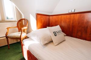 Katil atau katil-katil dalam bilik di Union Hotel Prague