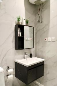 Koupelna v ubytování Zaan Apartment Al-Nafel