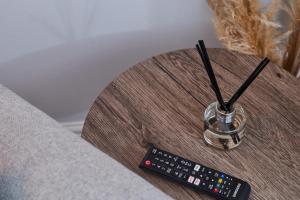 a remote control sitting on top of a table at The Derwent in Darlington