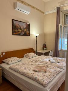 Postel nebo postele na pokoji v ubytování Good Luck