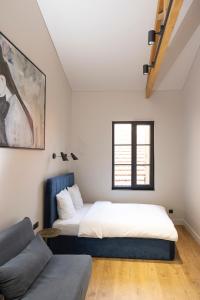 Tempat tidur dalam kamar di Centrum Nice