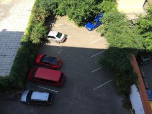 an overhead view of cars parked in a parking lot at Charles Square Hostel in Prague