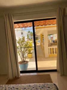 Mynd úr myndasafni af Joli appartement avec vue sur la piscine í Boca Chica