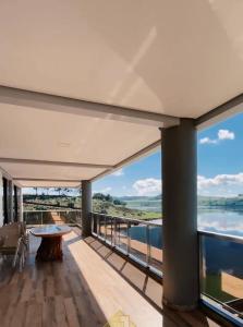 a view from the balcony of a house at casa nas marinas boa vista in Boa Vista Parecida