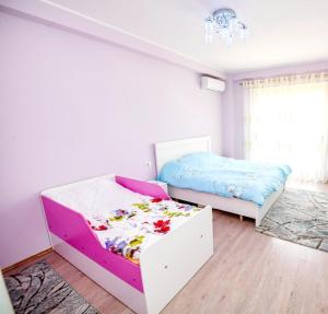 A bed or beds in a room at Happy stories' apartment in city centre