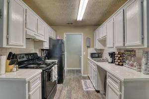 A kitchen or kitchenette at NEW! Location, Pool, WIFI & Fully Equipped!