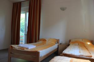 Letto o letti in una camera di Rooms Zebax