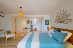 Postel nebo postele na pokoji v ubytování Orient bay - Apartment Oceanview - Alamanda beach residence