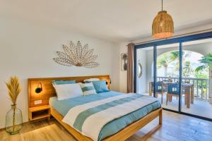 Postel nebo postele na pokoji v ubytování Orient bay - Apartment Oceanview - Alamanda beach residence + 14 fotografií