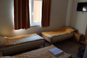 Letto o letti in una camera di Rooms Zebax
