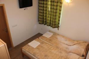 Letto o letti in una camera di Rooms Zebax