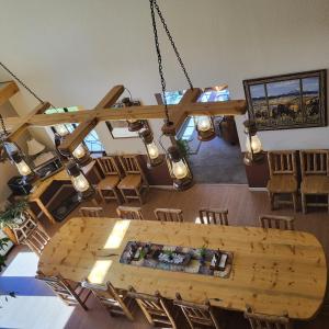 an overhead view of a room with a table and chairs at BuffaloPeaks Lodge in Buena Vista