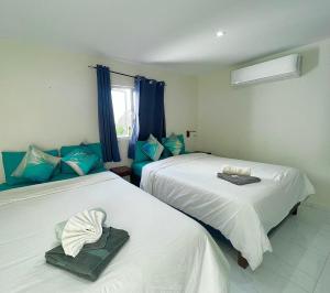 Postel nebo postele na pokoji v ubytování Boca Simon Vacation Curacao