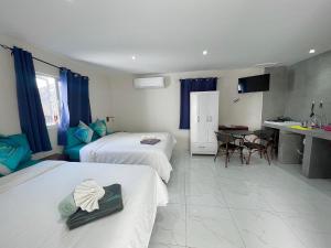 Postel nebo postele na pokoji v ubytování Boca Simon Vacation Curacao