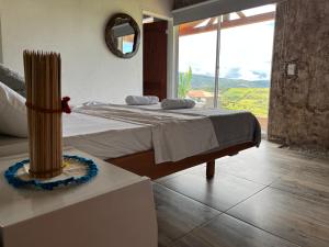 Postel nebo postele na pokoji v ubytování Cabaña Villa Lucia