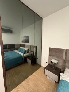 Posteľ alebo postele v izbe v ubytovaní Apartment Kovacevic With Sea View