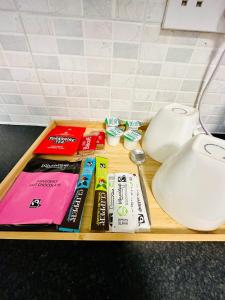 a shelf with a toilet and other items on it at Private Studio Flat in City 1160 in London