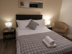 Postel nebo postele na pokoji v ubytování charming studio flat Preston