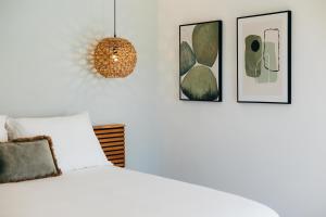 Un pat sau paturi într-o cameră la Pietermaai Oasis