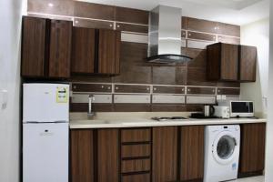 Küche/Küchenzeile in der Unterkunft Shouel Inn Furnished Apartments