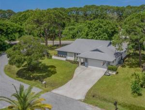 an overhead view of a house with a driveway at New! Fully Renovated 3/2 Luxury Vacation Home in Venice