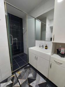 Koupelna v ubytování Apartman OMANOVIĆ + 16 fotografií
