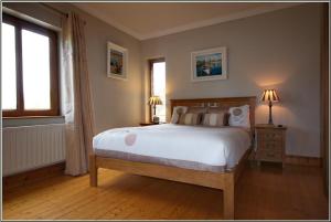 Katil atau katil-katil dalam bilik di Oranhill Lodge Guesthouse