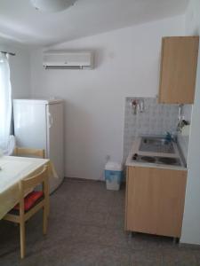Kuchyň nebo kuchyňský kout v ubytování Apartment Viktor