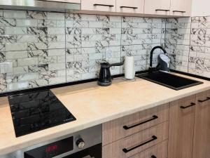 Köök või kööginurk majutusasutuses Fantasy Apartment