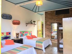 Postel nebo postele na pokoji v ubytování Mamatina Hotel