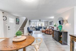a kitchen and living room with a table and chairs at Cozy Home w/ Sonos + Walking to Notre Dame in South Bend