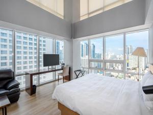 TV a/nebo společenská místnost v ubytování Haeundae Seacloud Hotel Residence