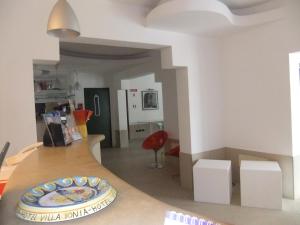 Kuchyňa alebo kuchynka v ubytovaní Hotel Villa Ionia