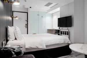 Katil atau katil-katil dalam bilik di Hotel Relax III