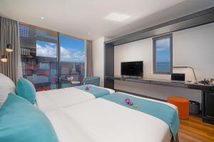 Telewizja i/lub zestaw kina domowego w obiekcie The Code Hotel & Spa Da Nang