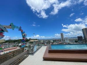 a view from the roof of a building with a swimming pool at The Light Hostel in Ha Long