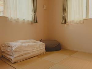 湘南民泊kabigon客房内的一张或多张床位