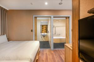 Postel nebo postele na pokoji v ubytování 綺樂文旅 康定館 Le Room Hotel Kangding