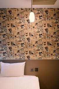 Postel nebo postele na pokoji v ubytování 綺樂文旅 康定館 Le Room Hotel Kangding