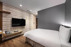 TV a/nebo společenská místnost v ubytování 綺樂文旅 康定館 Le Room Hotel Kangding