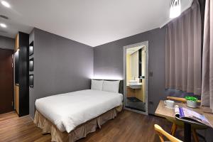 Postel nebo postele na pokoji v ubytování 綺樂文旅 康定館 Le Room Hotel Kangding
