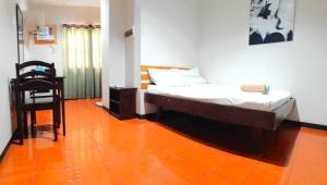 Letto o letti in una camera di Hotel California Suite