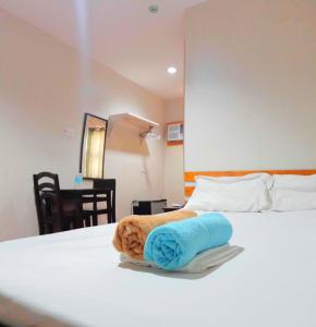 Letto o letti in una camera di Hotel California Suite