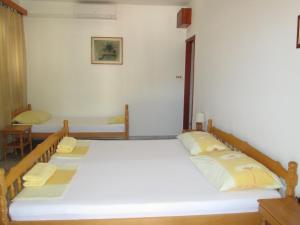 Postel nebo postele na pokoji v ubytování Accommodation Drasko
