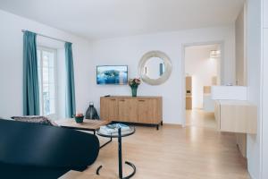 TV a/nebo společenská místnost v ubytování River Residence