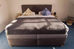 a bedroom with a large bed in a room at Hotel Baroko in Prague