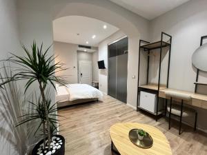 Postel nebo postele na pokoji v ubytování Enzo rooms & apartment Blloku