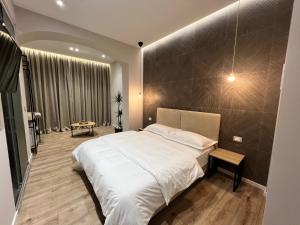 Postel nebo postele na pokoji v ubytování Enzo rooms & apartment Blloku